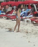 Random young beauty on the beach of St. Maarten