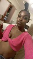 Black girl in pink top