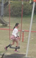 japanese girl is playing the swing