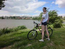 teen girl posing with bike